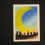 大きな月と星のパステル画の写真です。